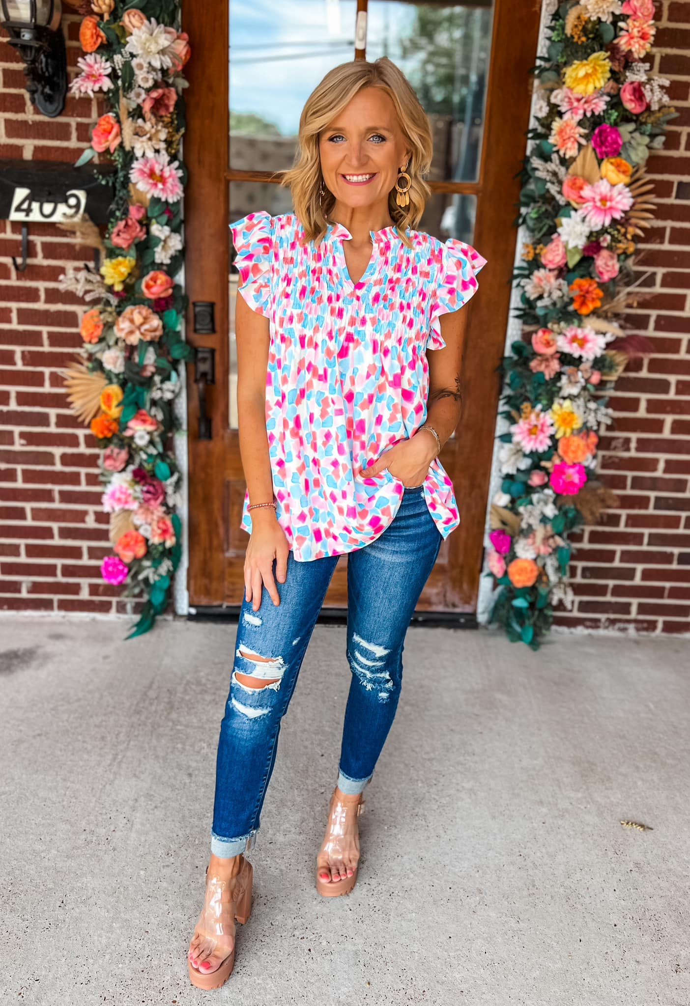 Ruffled Printed Notched Cap Sleeve Blouse