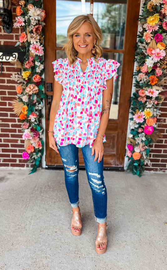 Ruffled Printed Notched Cap Sleeve Blouse